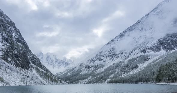 Snow Mountain Lake Timelapse at the Autumn Time