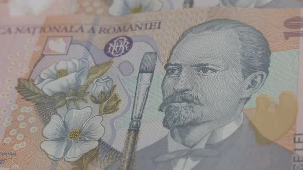 Panning over   Romanian lei national currency 3840X2160p 30fps UltraHD  video - Slow pan on paper ba