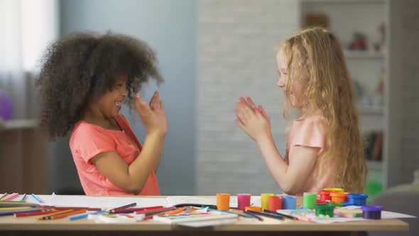 Young Multiracial Ladies Having Fun and Clapping Hands at Home, Leisure Time