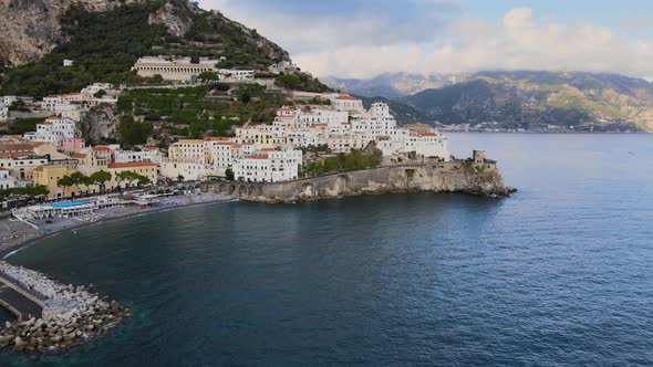 Scenic Coastline and Small City on Italian Coast of Mediterranean Sea. Aerial View of Amalfi, Campan