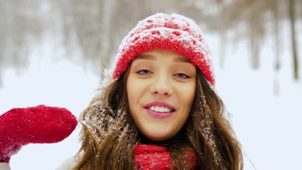 Young Woman Video Blogging in Winter Forest 2