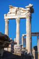 Vertical photo of ruins of the Temple of Trajan on a background of blue sky. Bergama, Turkey. - PhotoDune Item for Sale