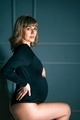 Pregnant woman with big belly in black bodysuit,lingerie. Sexy attractive girl photoshoot in  - PhotoDune Item for Sale