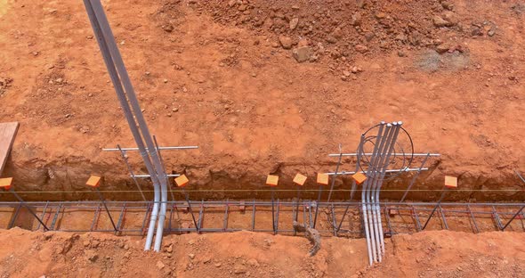 Building a House Foundation with Steel in a Trench
