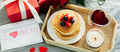Banner image for desing web page. Mother's Day concept. Pancakes with berry, tea cup, burning candle - PhotoDune Item for Sale