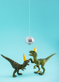 Two cute green dinosaurs dancing under disco ball. Funny idea for birthday card on blue background. - PhotoDune Item for Sale