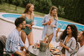 Young people have Summer Celebration of Food, Drink, and Friendship - PhotoDune Item for Sale