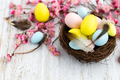 Stylish background with colorful easter eggs on white wooden background with copy space - PhotoDune Item for Sale