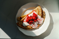 Top view of Pancakes with sour cream and berries on a plate - PhotoDune Item for Sale