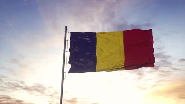 Chad Flag Waving in the Wind Dramatic Sky Background