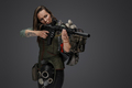 Killer woman in setting of post apocalypse with rifle - PhotoDune Item for Sale