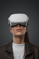 Studio headshot of woman with virtual reality headset - PhotoDune Item for Sale