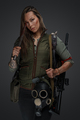 Determined female killer with huge knife and rifle - PhotoDune Item for Sale