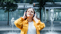 Outdoor portrait of Woman in headset in sound healing therapy. Healing Sounds and Sound Therapy - PhotoDune Item for Sale