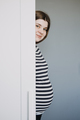Candid creative portrait of the young pregnant woman in striped t-shirt. Pregnancy, expecting woman - PhotoDune Item for Sale