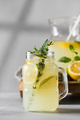 Homemade lemonade with fresh lemon slices and mint leaves in a glass. A summer refreshing drink. - PhotoDune Item for Sale