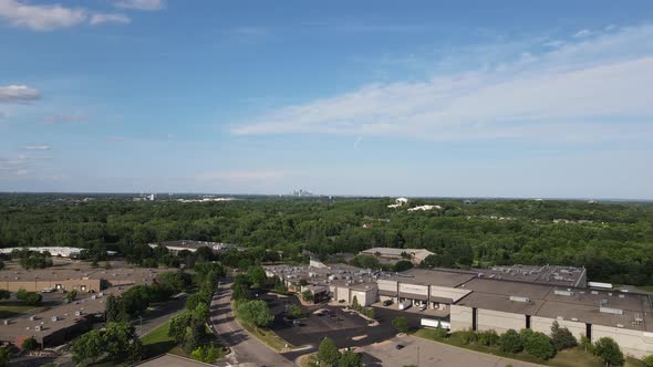 Business park area on the edge of Hopkins, Minnesota. Lots of trees surrounding all buildings.