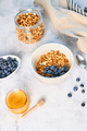 Homemade granola with nuts and fresh blueberries for breakfast. Healthy breakfast. Vegetarian food  - PhotoDune Item for Sale