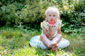 cute caucasian girl eating watermelon in countryside - PhotoDune Item for Sale