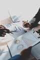 Team Business people planning at a meeting business consultant pointing to graph and analyzing chart - PhotoDune Item for Sale