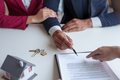 Couple enters into a home purchase contract with a real estate agent, getting advice, insurance - PhotoDune Item for Sale