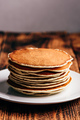 Stack of american pancakes on white plate - PhotoDune Item for Sale