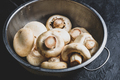 Button mushrooms in metal colander - PhotoDune Item for Sale