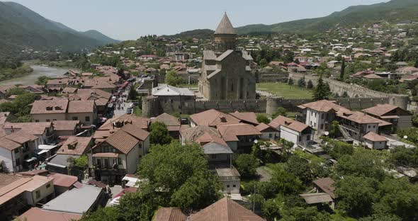 Mtskheta Townscape With Svetitskhoveli Cathedral In Georgia. Aerial Pullback Shot