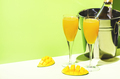 Mango bellini alcoholic cocktail drink with prosecco or champagne, mango puree, syrup and ice. - PhotoDune Item for Sale