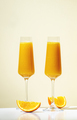 Mimosa alcohol cocktail drink with orange juice and cold dry champagne or sparkling wine in glasses - PhotoDune Item for Sale