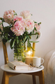 Open book with glasses, cup coffee and bouquet white pink peonies flowers. Read and rest. Cozy home - PhotoDune Item for Sale