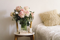 Open book with glasses, cup coffee and bouquet white pink peonies flowers. Read and rest. Cozy home - PhotoDune Item for Sale