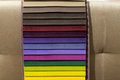 Catalog of multi-colored fabric samples. Textile industry background. - PhotoDune Item for Sale