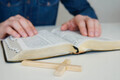 Christian catholic man concentrate on reading Holy Bible at home. Sunday readings. - PhotoDune Item for Sale