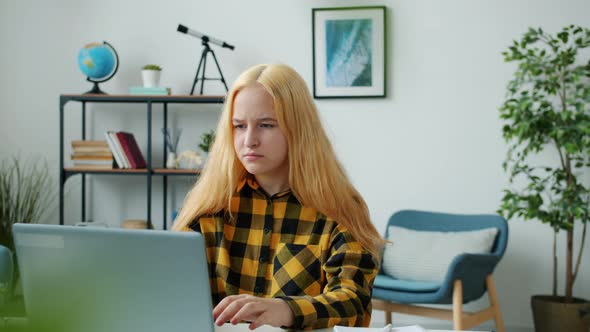 Mad Teenager Using Laptop Failing Task Then Turning Off Device and Leaving Room