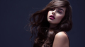 Face of a beautiful woman with long brown curly hair.  - PhotoDune Item for Sale