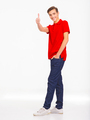 Full Portrait of happy young man showing thumbs up gesture, isolated over white background.  - PhotoDune Item for Sale