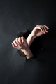 Female hands, on a black, torn background. - PhotoDune Item for Sale
