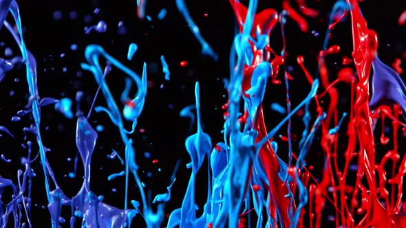 Colorful Splashing Paint in Super Slow Motion. Shot with High Speed Cinema Camera at 1000Fps