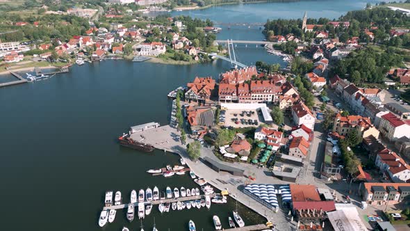 Panorama over the Mikolajskie lake and Mikolajki in Poland - Touristic city in Warmian Masurian with