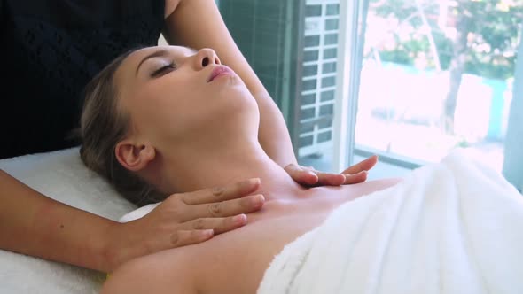 Woman Gets Shoulder Massage Spa By Therapist