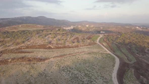 Aerial view of a desert hill in the outskirts of Arraba Palestine