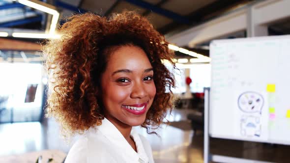 Businesswoman smiling in office