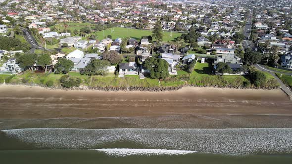 Beach front property on the coastline of New Zealand in Red Beach