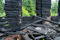 burnt wooden house in the countryside - PhotoDune Item for Sale