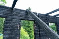 burnt wooden house in the countryside - PhotoDune Item for Sale