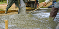 Construction worker pour wet concrete at construction site. Construction worker working with ready - PhotoDune Item for Sale