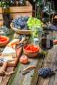 Supper on old wooden table with appetizers and wine - PhotoDune Item for Sale