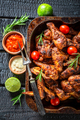 Tasty roasted chicken leg served with sauces and lime. - PhotoDune Item for Sale