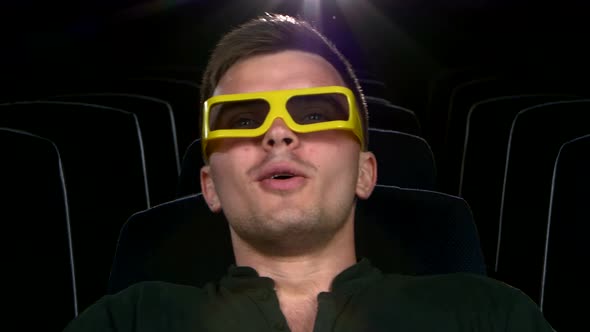 Boy Sitting at Cinema, Close Up. 3D Stereo Glasses. Comedy Film